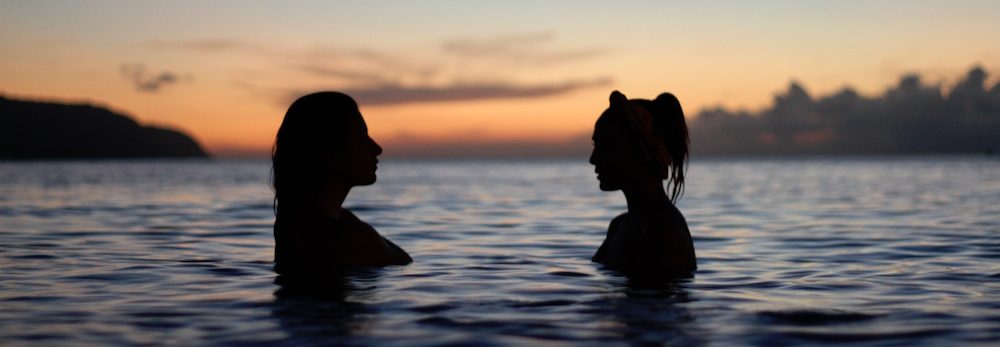 Two Women Talking Erol Ozan Travel Quote of the Week