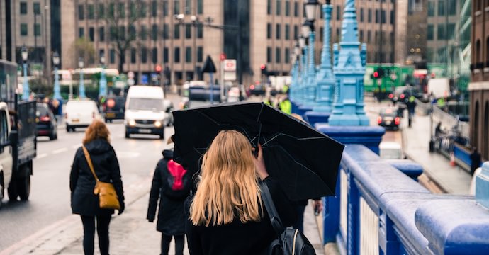 Overcome Travel Obstacles - Raining in London - Authentic Traveling