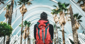 A traveler reflecting on their journey, symbolizing the process of finding your "why" in travel, offering advice on how to travel with purpose and create meaningful experiences.